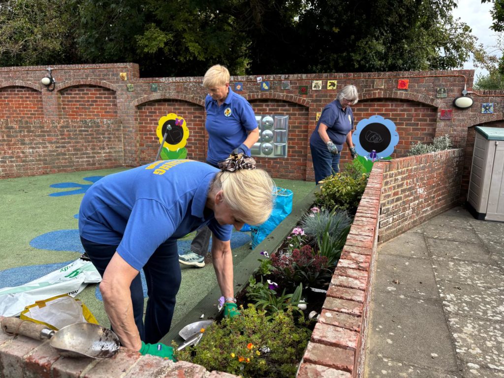 Angmering in Bloom members planting in the Library Garden