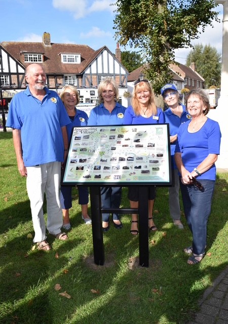 Angmering in Bloom team with the Heritage Map in Angmering, West Sussex